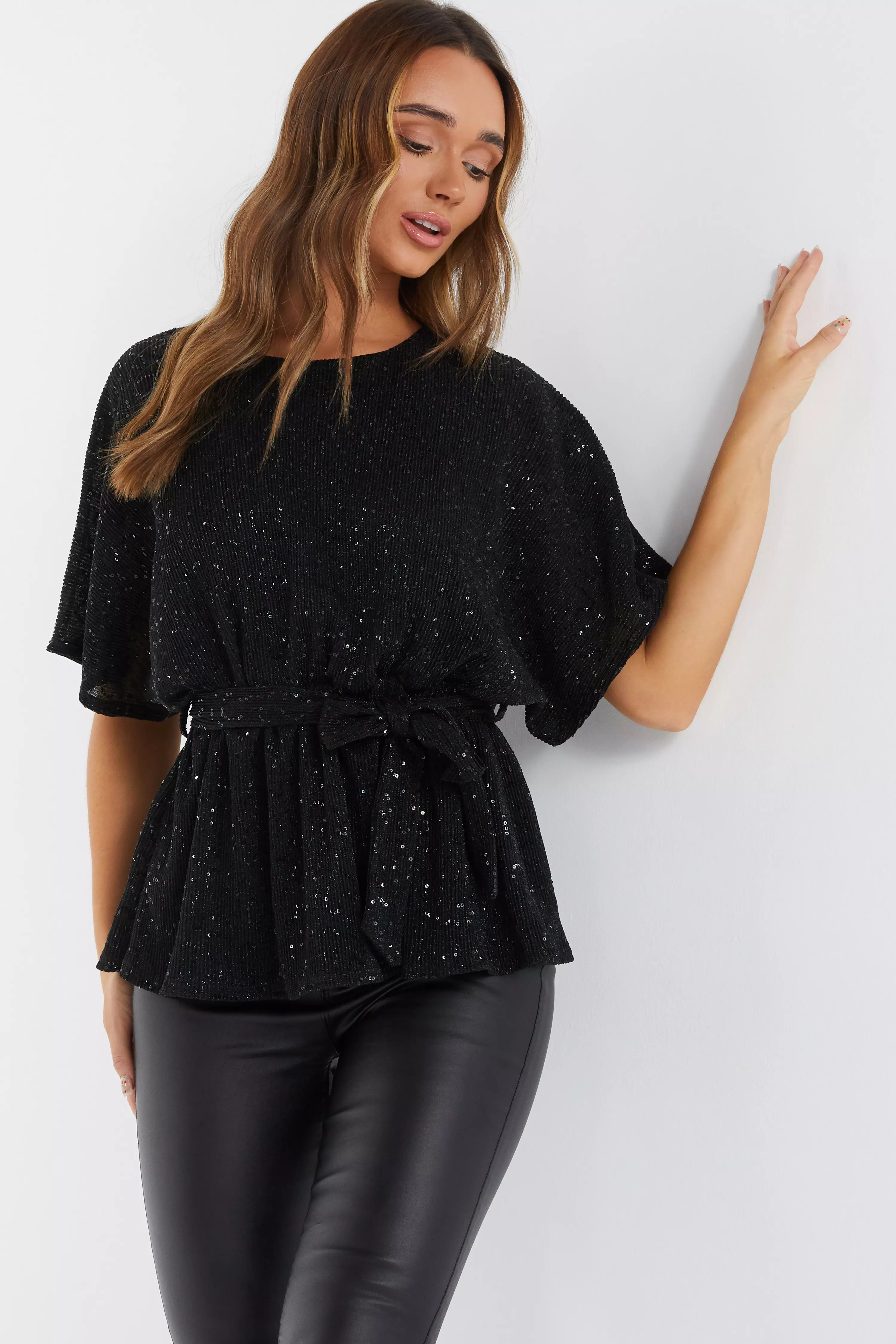 Black Sequin Batwing Peplum Top