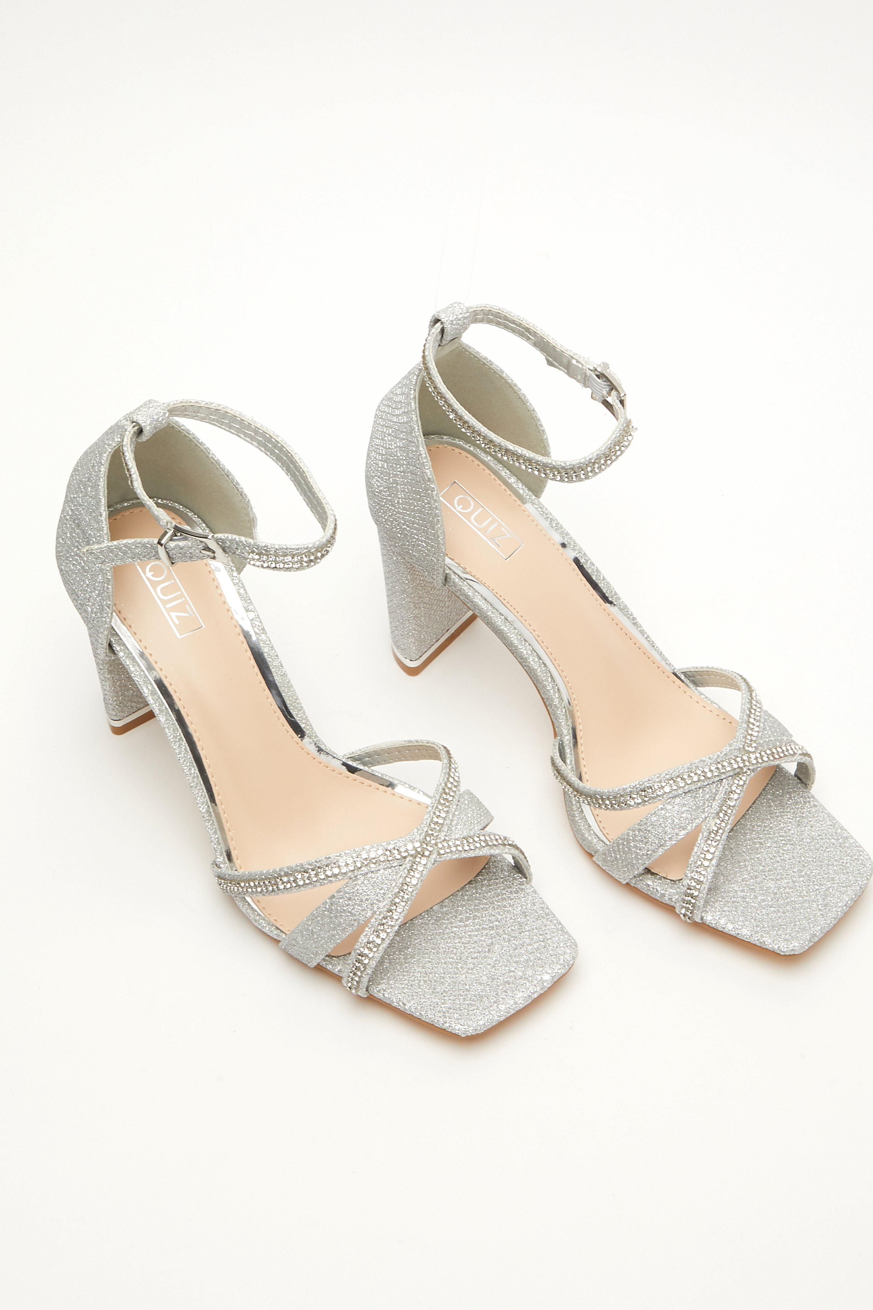 Quiz silver sale cross strap sandals