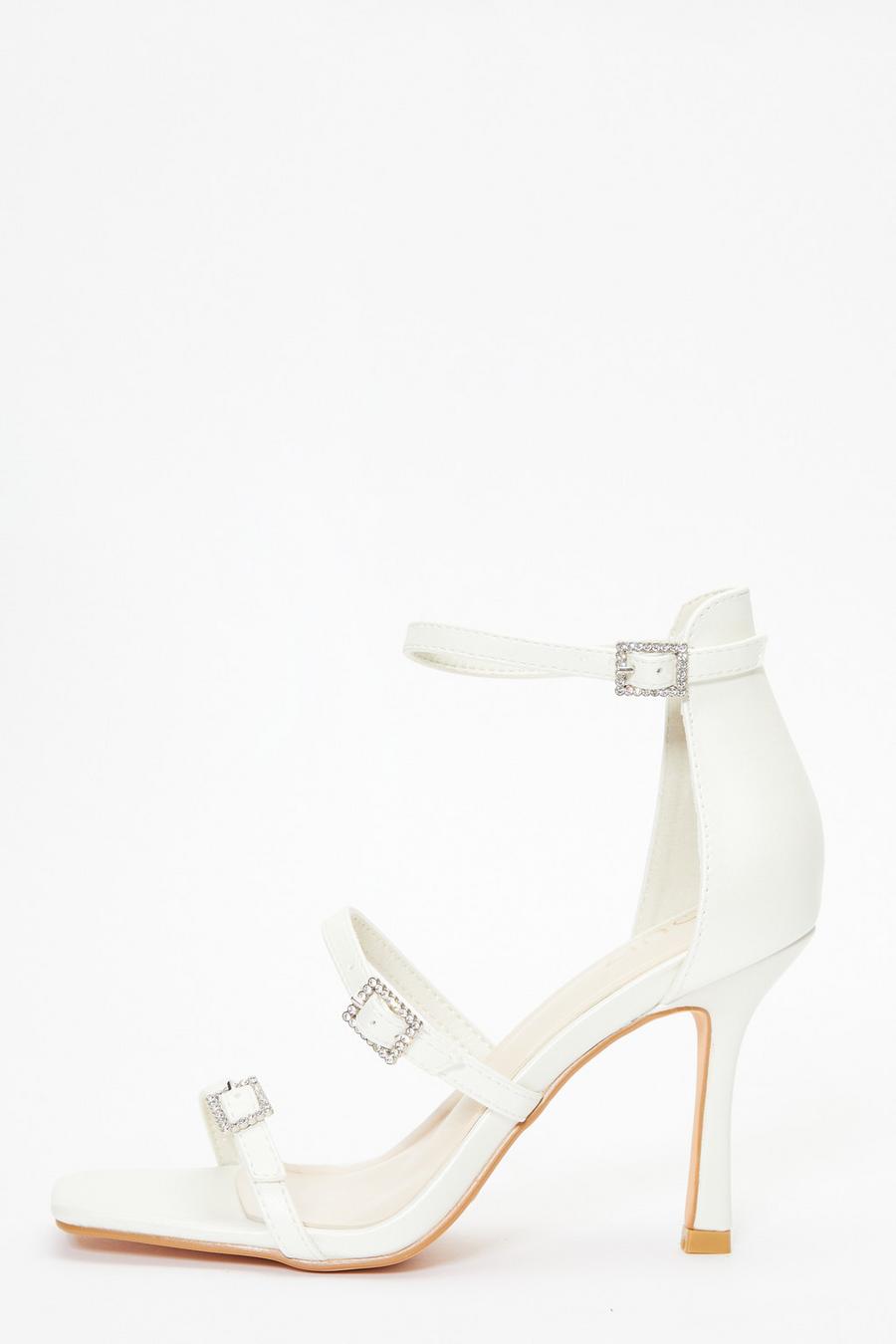 Strappy on sale buckle heels