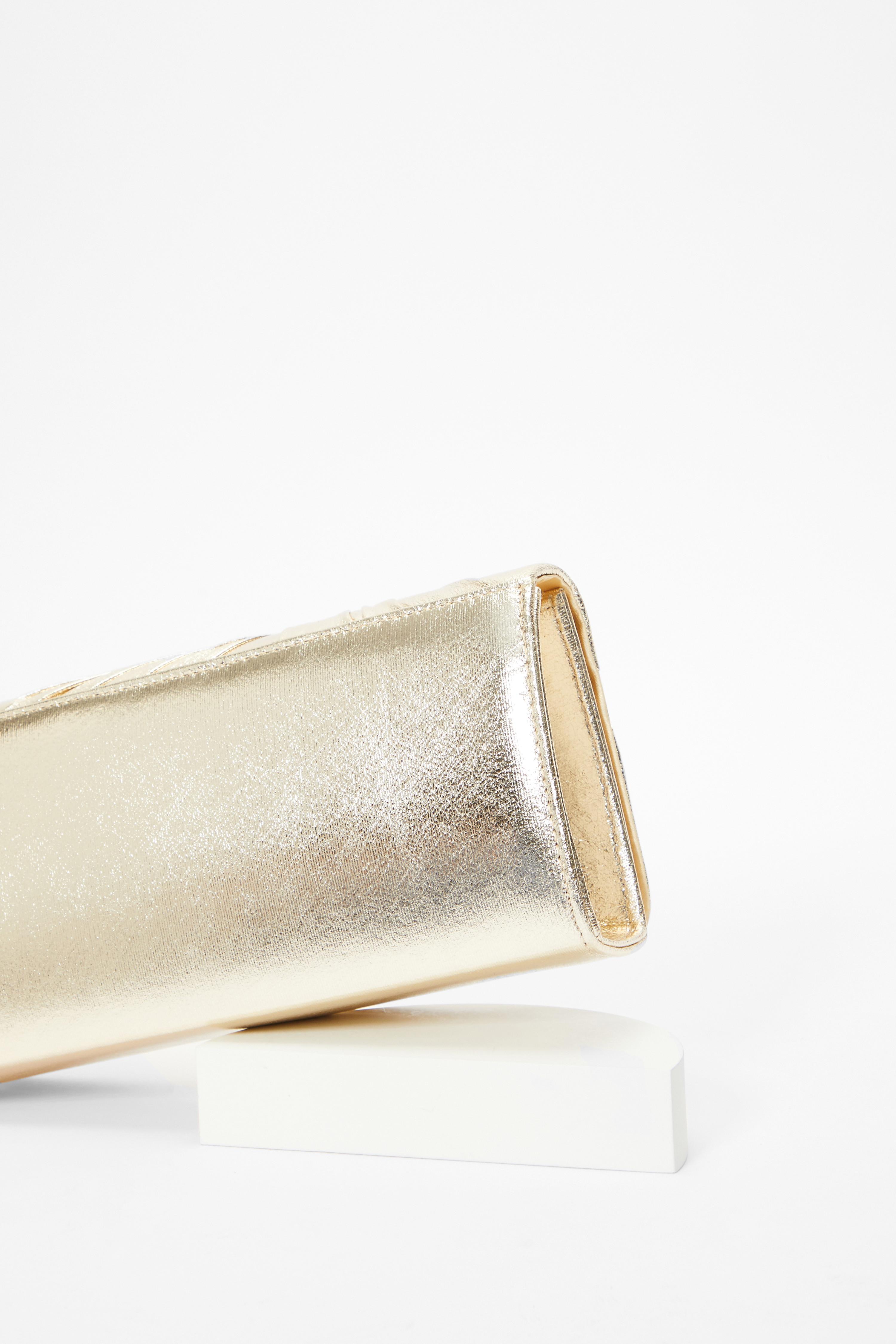 Quiz discount gold clutch