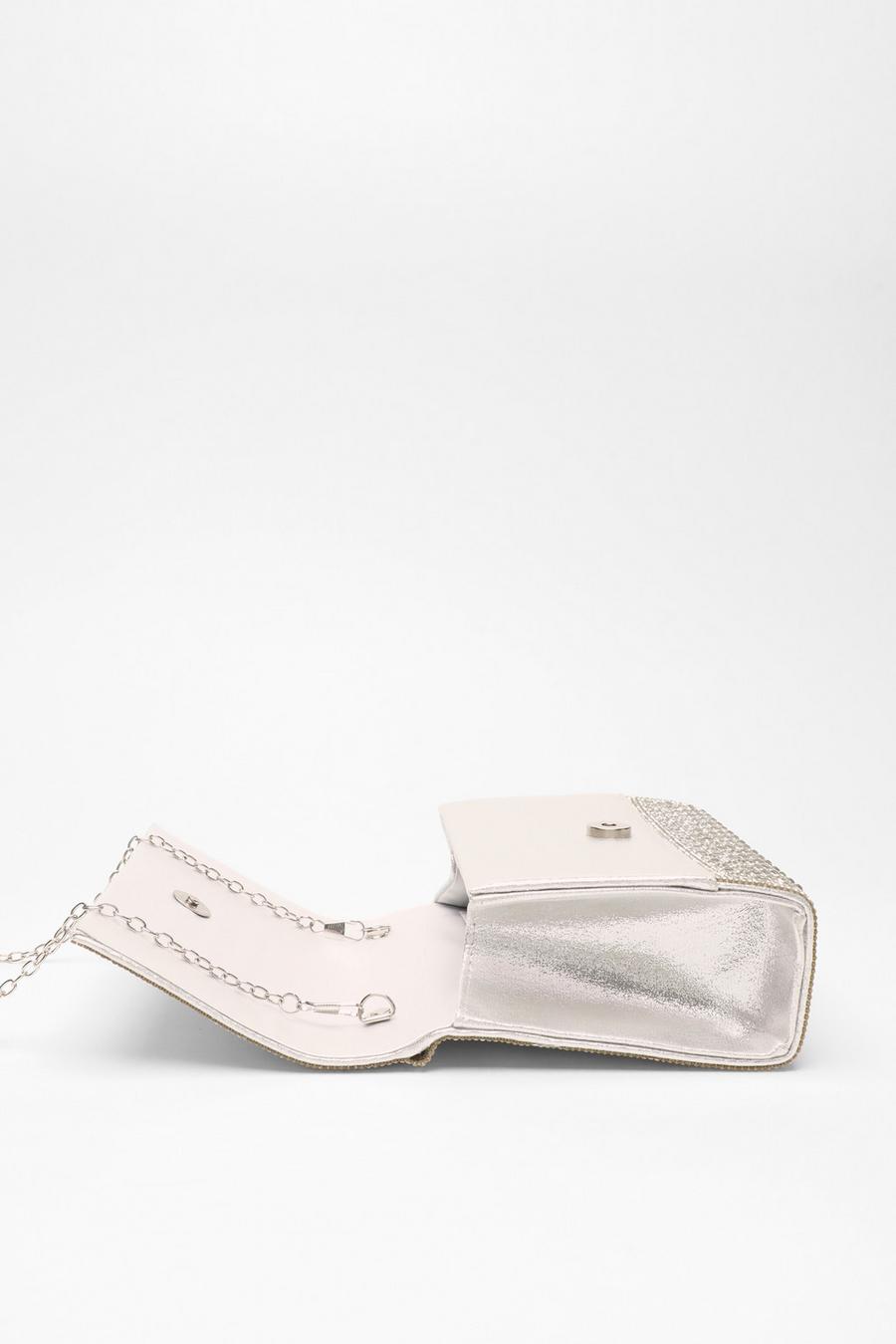 Quiz white clutch discount bag