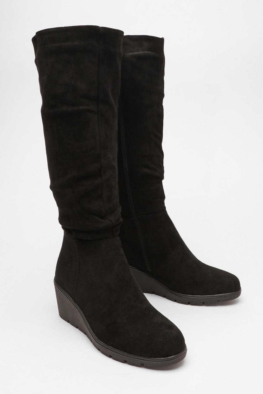 Knee high suede wedge on sale boots